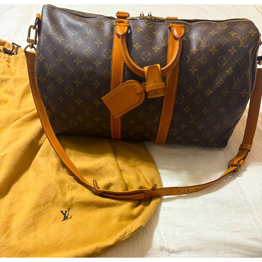 Louis Vuitton Keepall 45 Classic Brown Monogram with strap & luggage tag.